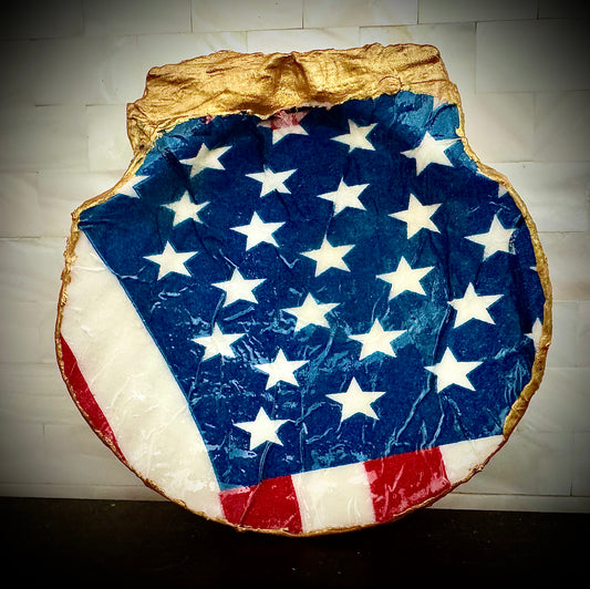 American flag on large scallop shell